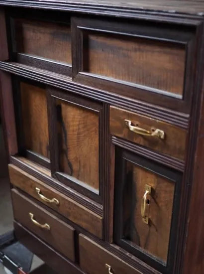 A small antique tea cabinet made entirely of solid black persimmon boards from the early Showa period.