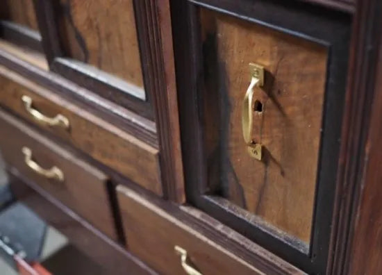 A small antique tea cabinet made entirely of solid black persimmon boards from the early Showa period.