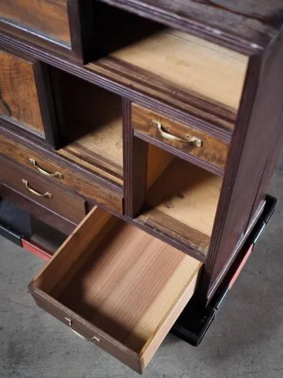 A small antique tea cabinet made entirely of solid black persimmon boards from the early Showa period.