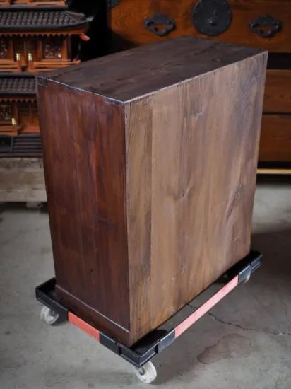 A small antique tea cabinet made entirely of solid black persimmon boards from the early Showa period.