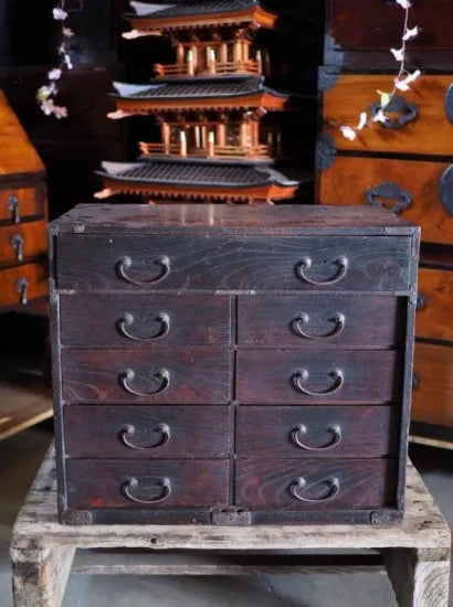 A heavy 100-year-old chest of drawers from the Meiji period